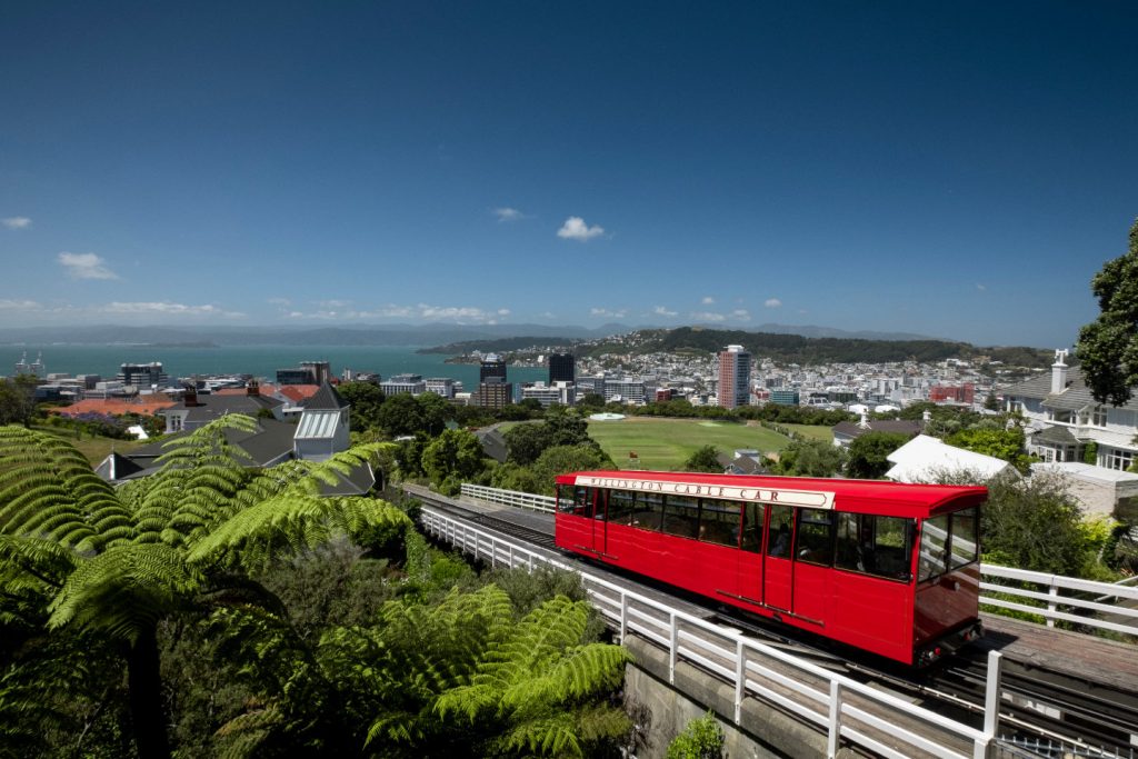Looking over the city of Wellington, New Zealand you can see the famous Cable Car approaching the viewing deck as seen on the City to Sea Walkway.